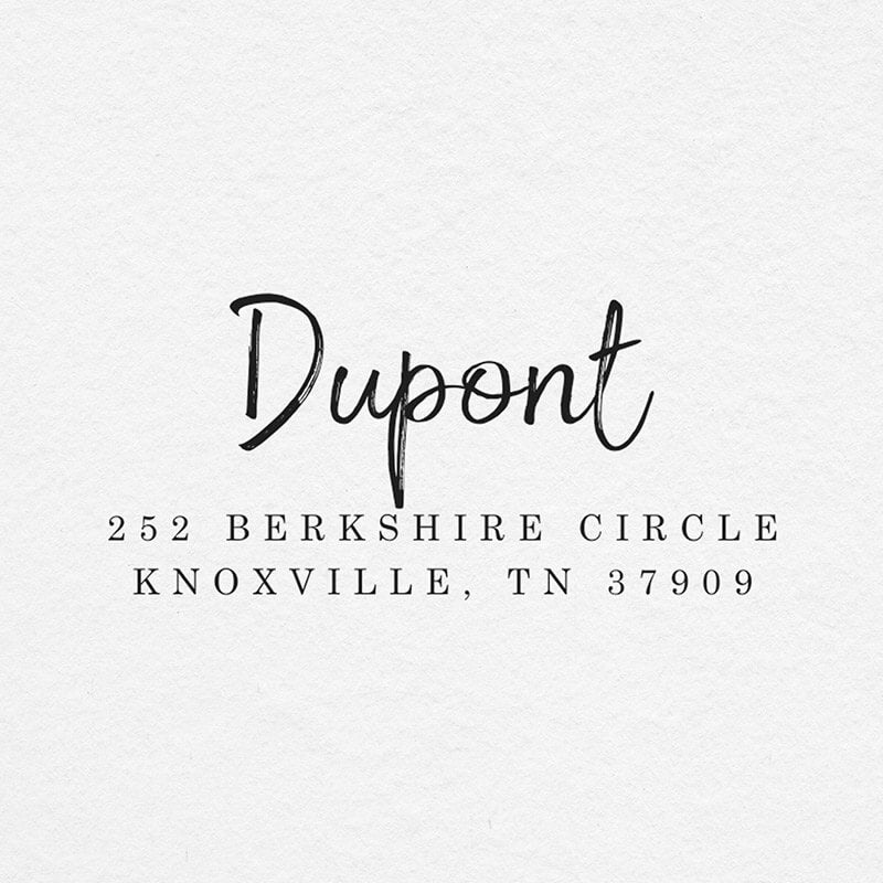 The impression made from the Dupont Brush Return Address Stamp on grey paper