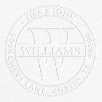 Example on grey paper of the impression made by the Williams Monogram Round Return Address Embosser