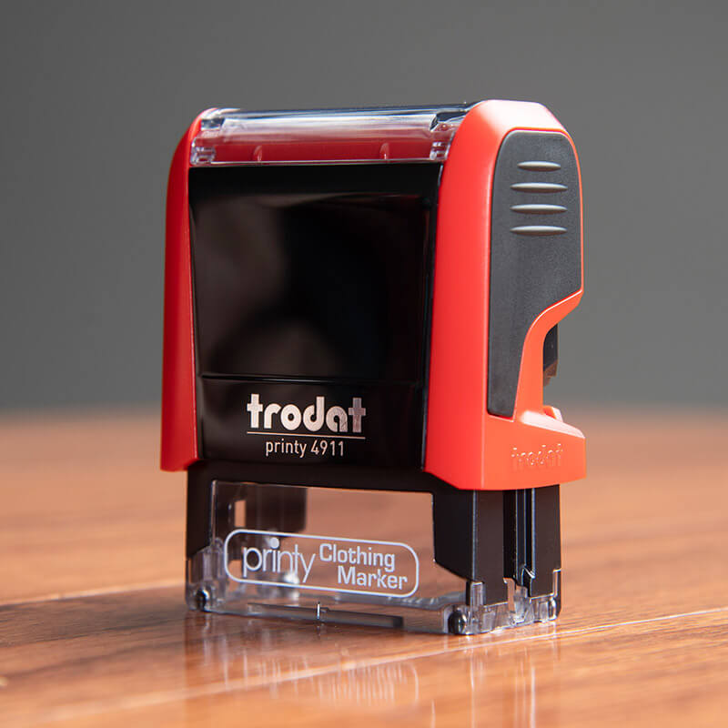 The Trodat Printy 4911 clothing stamp comes in a stylish red case