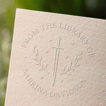 Book embosser impression stamp on paper