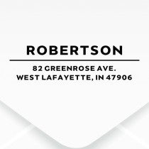 The impression made from the Dupont Brush Return Address Stamp on grey paper