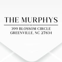 The impression made from the Dupont Brush Return Address Stamp on grey paper