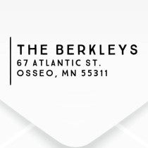 The impression made from the Dupont Brush Return Address Stamp on grey paper