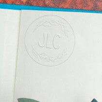 Example of custom book embosser impression on the inside of a book