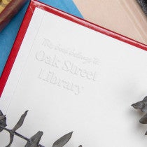 Another Example of Modern Serif Book Embosser Impression on Inside of Book