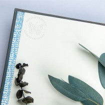 Book embosser impression on inside of book cover