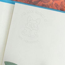 Example of custom book embosser impression inside of a book