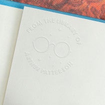 Example of the personalized book embosser impression on a book