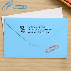 close up of an address stamp impression on a white envelope