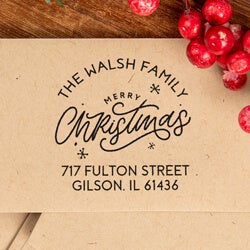 close up of Christmas address stamp impression on a white paper