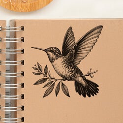stamp impression of a leaf on a brown box