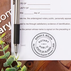 close up of notary stamp impression on the top right corner of a document