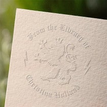 Lion's Pride custom book embosser impression on paper