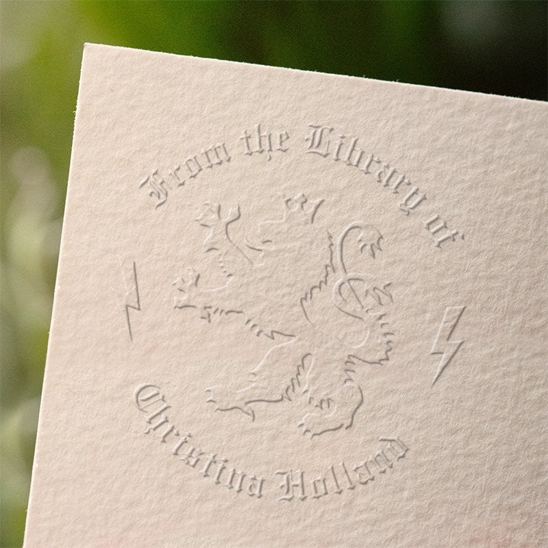 Lion's Pride custom book embosser impression on paper