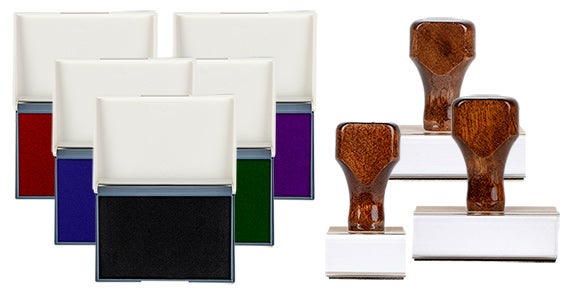 3 wood handle stamps and ink pads on a white background